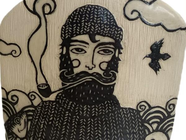 Sgraffito fisherman on ceramic vessel