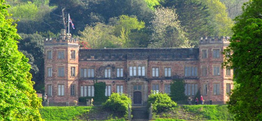 Mount Edgecumbe House, long low country house with turrets either end.